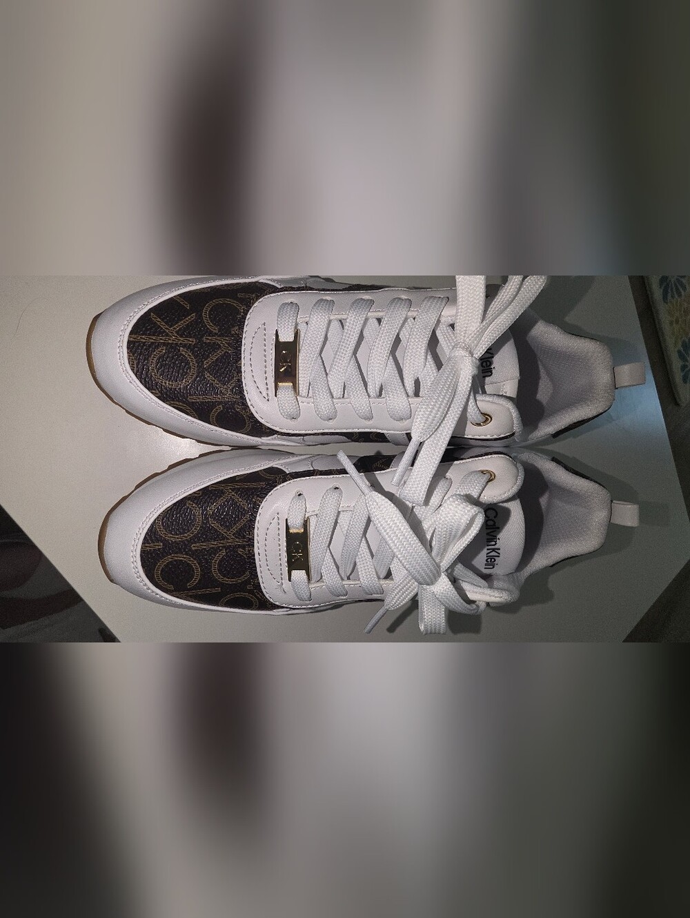 Calvin Klein Women's White Low-Top Sneakers with Gold Accents